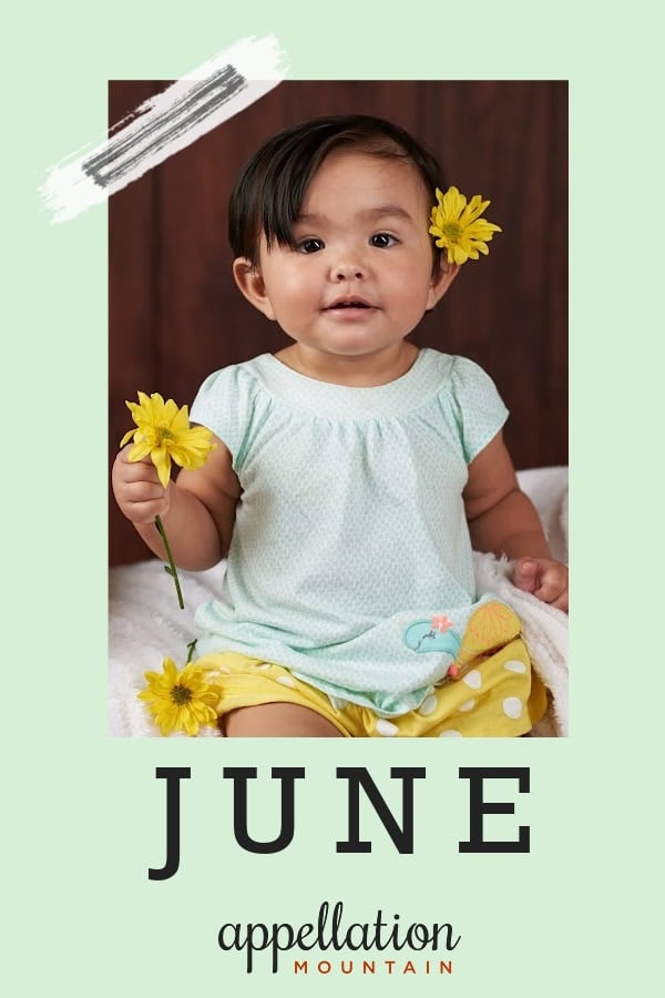 Latina girl wearing light blue dress with yellow flower in her hair, holding a yellow flower; baby name June