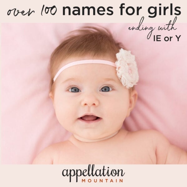 baby girl with pink floral headband on pink sheet; 3 syllable girl names ending in IE
