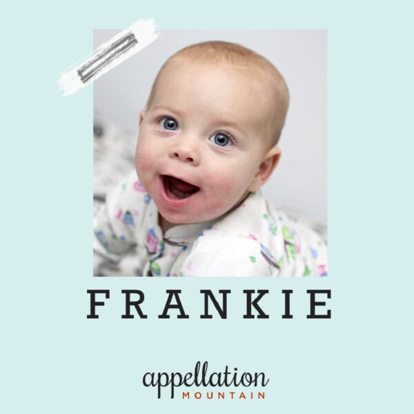 smiling baby on blue background with text "Frankie"