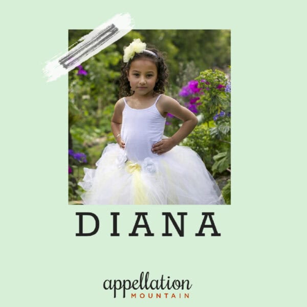 young girl with bow in her hair wearing white dress with full skirt; "baby name Diana"