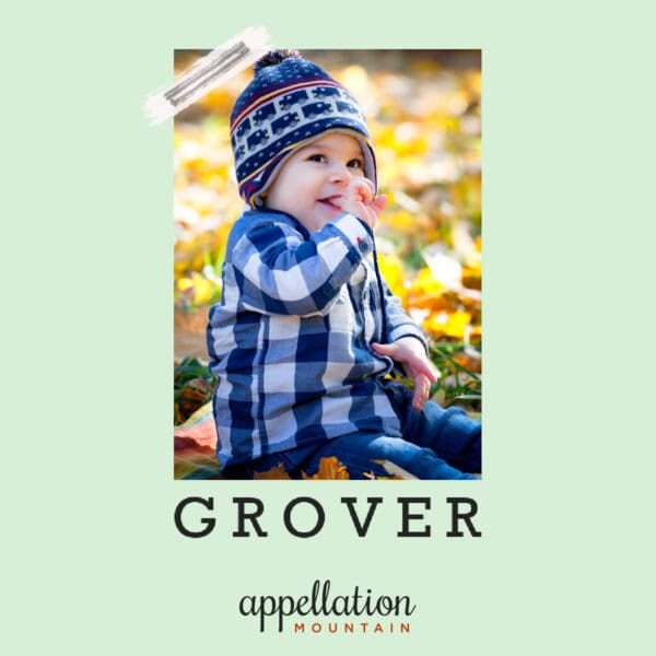 baby boy wearing blue flannel shirt and knit hat outside in the woods; baby name Grover