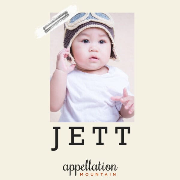 baby boy wearing white top and brown knit aviator-style cap; text reads "Jett"