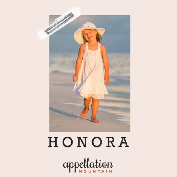 young girl in sundress and sunhat walking on the beach; baby name Honora