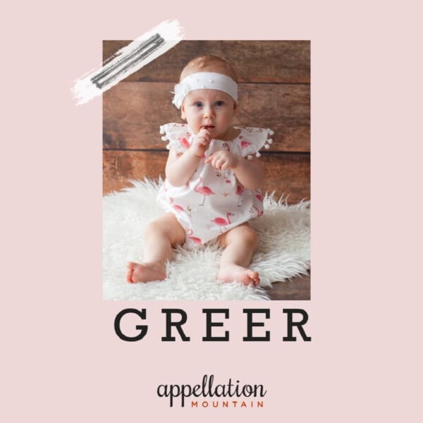 baby girl sitting up wearing floral headband and print outfit on white shag area rug against wooden backdrop; baby name Greer