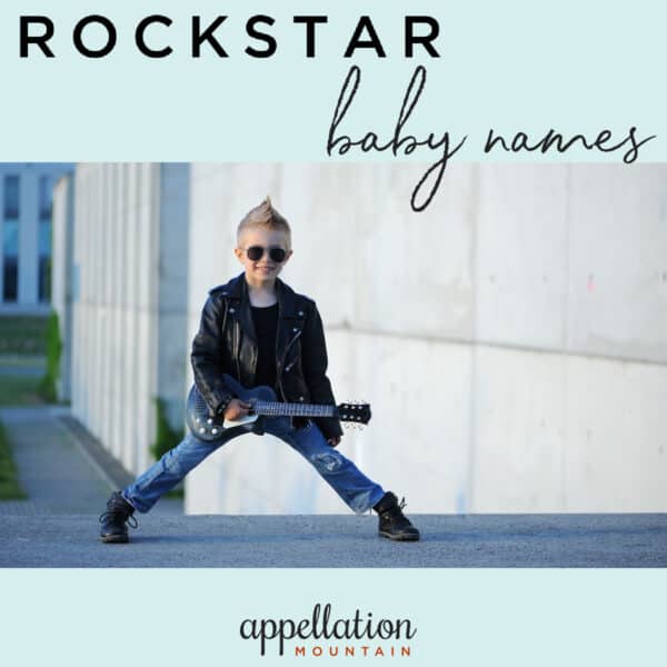 boy child wearing black leather jacket and blue jeans with spiked blonde hair and sunglasses holding guitar; text reads "Rockstar Baby Names"