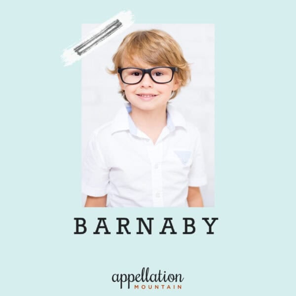 blonde boy child wearing white shirt with black-framed glasses; baby name Barnaby