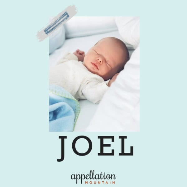 sleeping baby boy wearing white shirt with blue blanket; baby name Joel