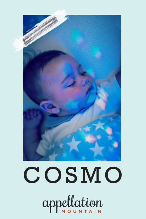 sleeping baby in dark room; baby name Cosmo