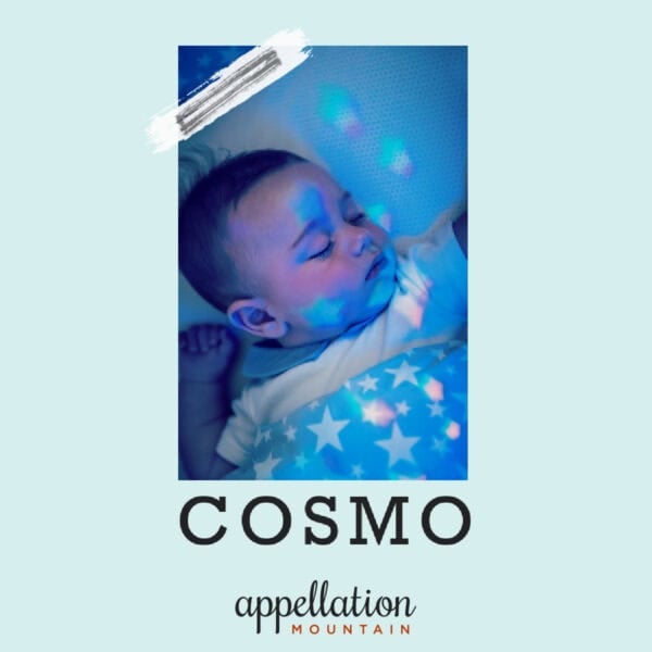 sleeping baby in dark room; baby name Cosmo