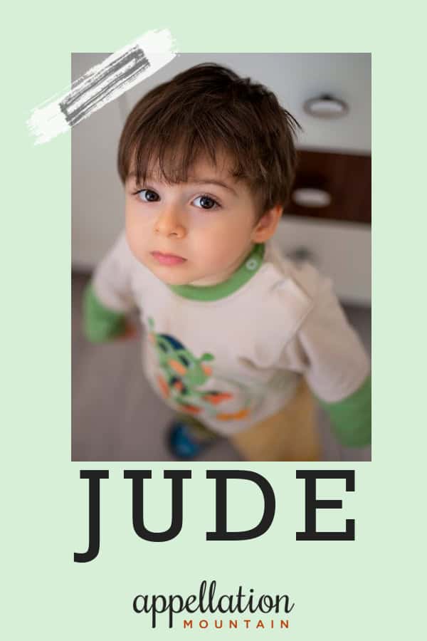 toddler boy with dark hair and dark eyes wearing pajamas; baby name Jude