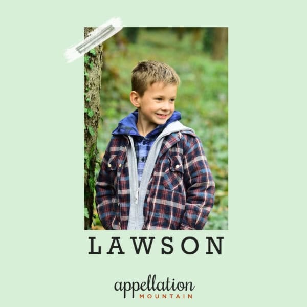 blonde boy child standing outside wearing flannel jacket over hoodie; baby name Lawson