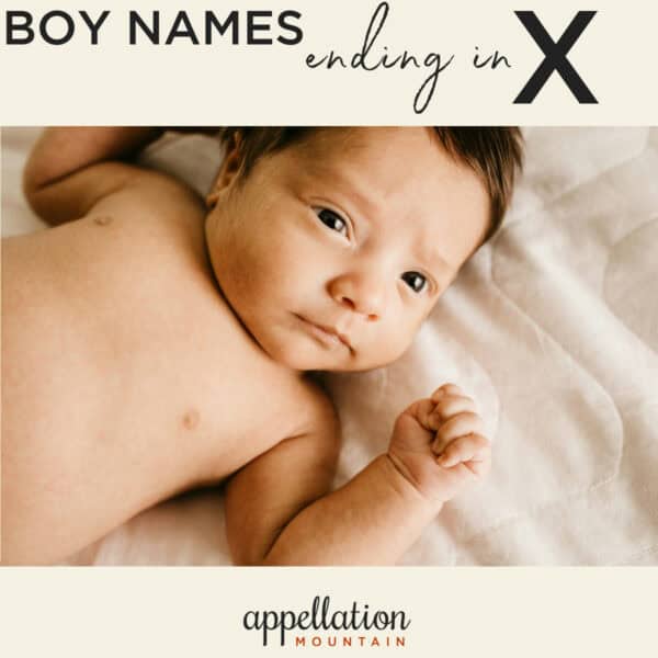 baby boy with dark hair lying on his back with arms up; boy names ending in X