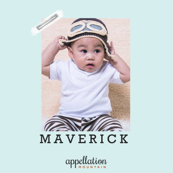 baby boy wearing knit aviator-style cap, "baby name Maverick"