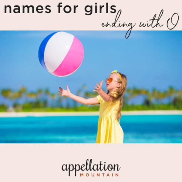 girl child in yellow sundress with large beach ball on beach; girl names ending with O