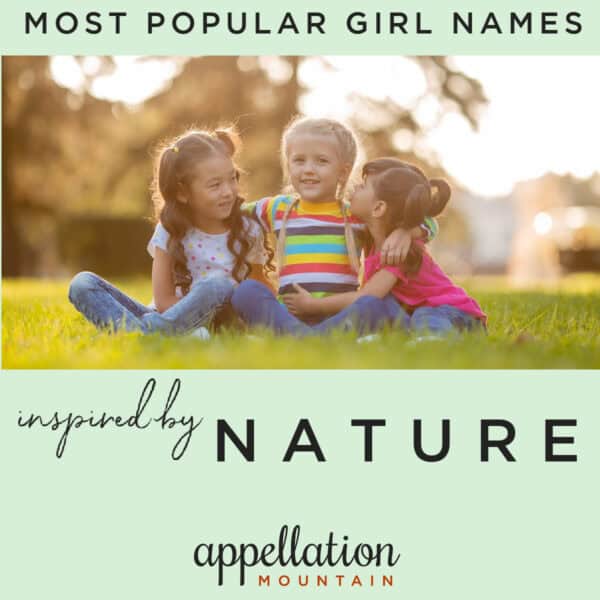 three girls sitting outside on grass; most popular nature names for girls