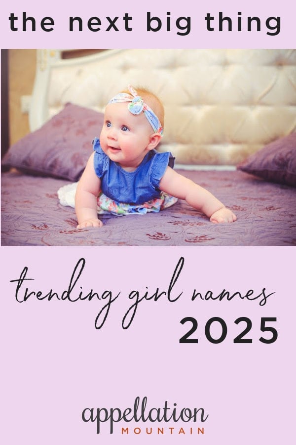 girl baby wearing blue dress and headband on bed with light purple blanket; "future Top 1000 girl names"