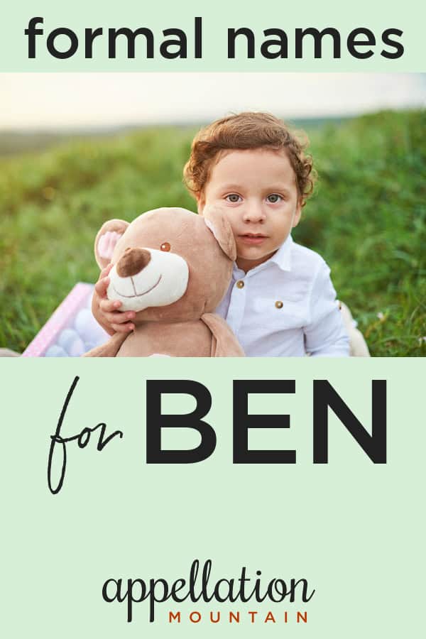 Latino boy with teddy bear wearing white shirt sitting in field of grass; nickname Ben