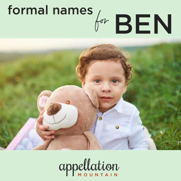 Latino boy with teddy bear wearing white shirt sitting in field of grass; nickname Ben