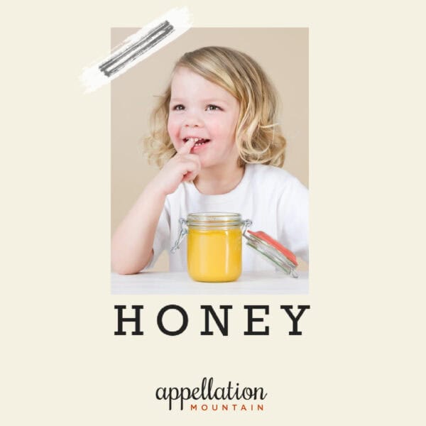 girl child with blonde hair eating honey; baby name Honey