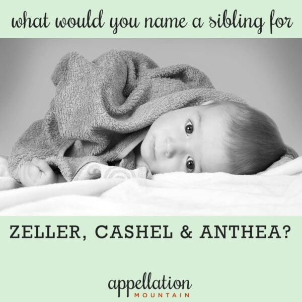 baby with dark hair laying on its side wrapped in a blanket "name help: sibling for Zeller, Cashel, and Anthea"
