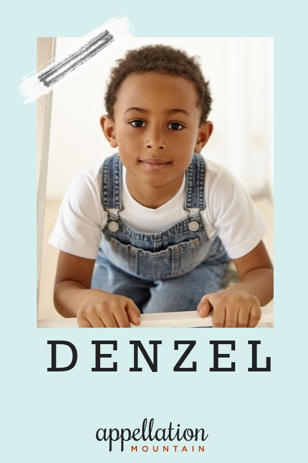 boy with light brown skin and short hair wearing white tee shirt and denim overalls; baby name Denzel