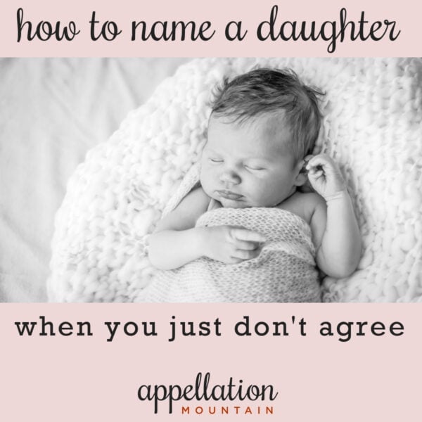 sleeping baby girl wrapped in blanket; agreeing on girl names