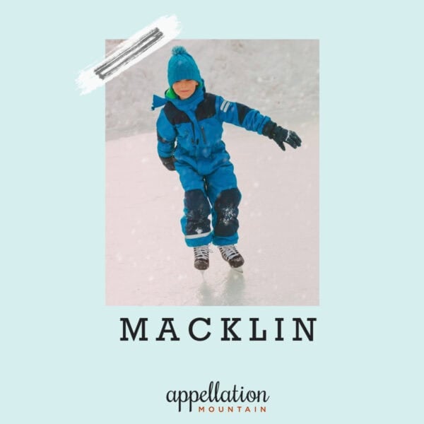 boy wearing blue jacket, hat, and snow pants plus hockey skates skating outside on snowy day; baby name Macklin