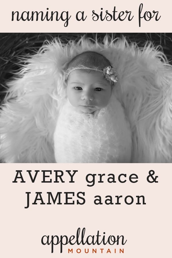 girl baby wrapped in white blanket, wearing heaadband, resting on furry blanket "bridging classic and current names"