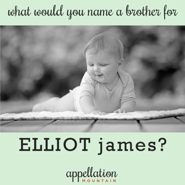 blonde baby boy propped up on his arms outdoors with trees in background; names like Elliot