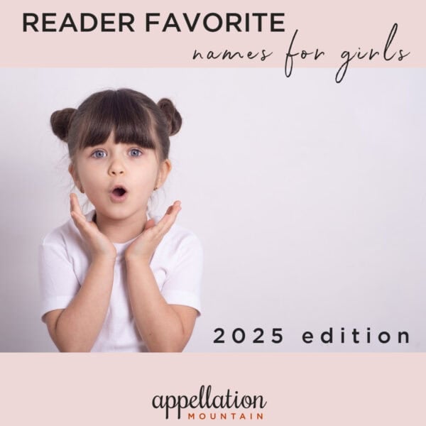 girl child with dark hair in buns, wearing white tee shirt; top girl names 2025