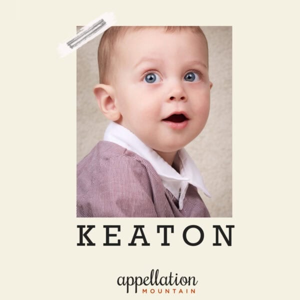 baby boy with blue eyes and light brown hair wearing collared shirt and jacket; baby name Keaton