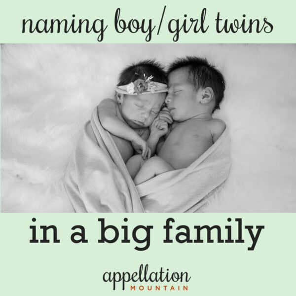 boy/girl infant twins snuggled together; naming twins in a big extended family