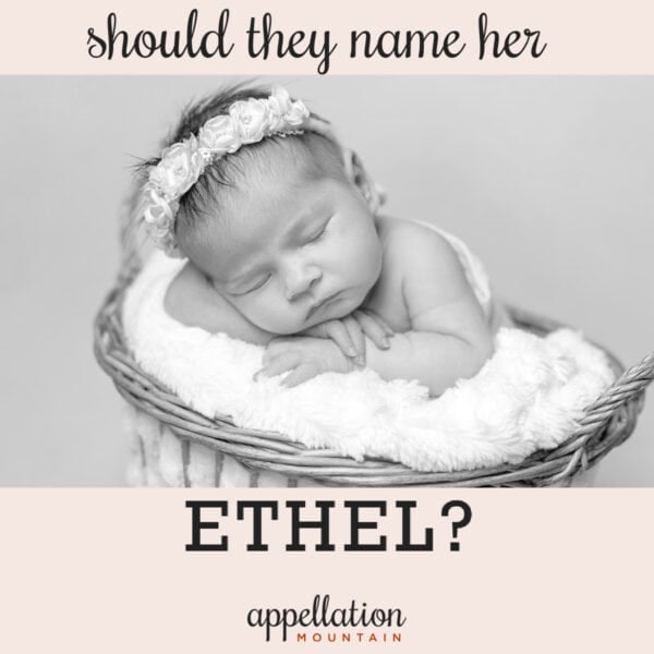 baby girl wearing floral wreath asleep on blanket in basket; family name Ethel