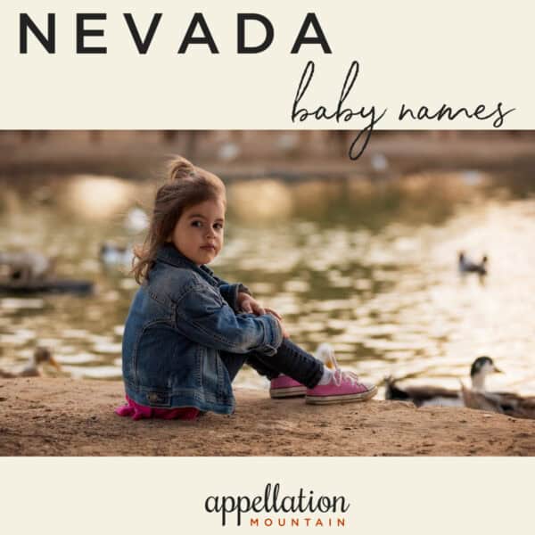 girl child sitting in front of lake; Nevada baby names
