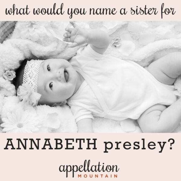 smiling baby girl wearing floral headband; naming Annabeth's sister