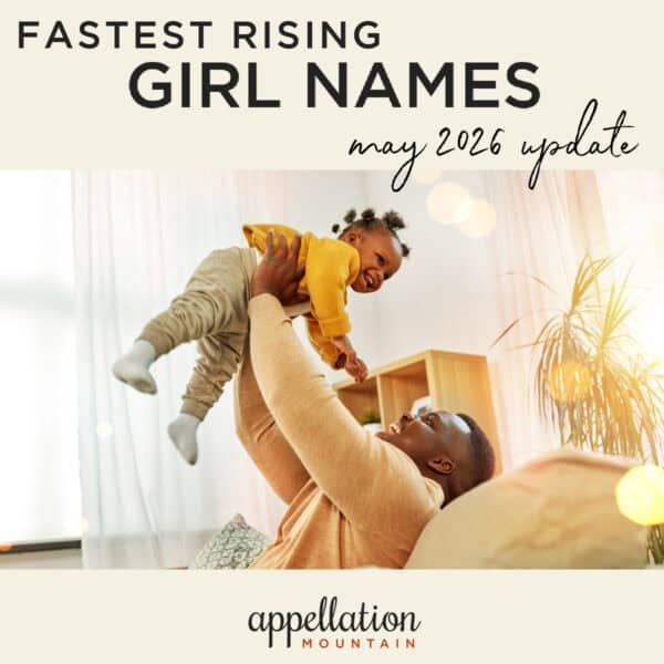 African American father lifting his young daughter in the air; fastest rising girl names 2026