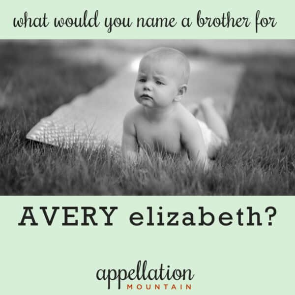 baby boy propped up on elbows on blanket on grassy lawn; naming Avery's brother