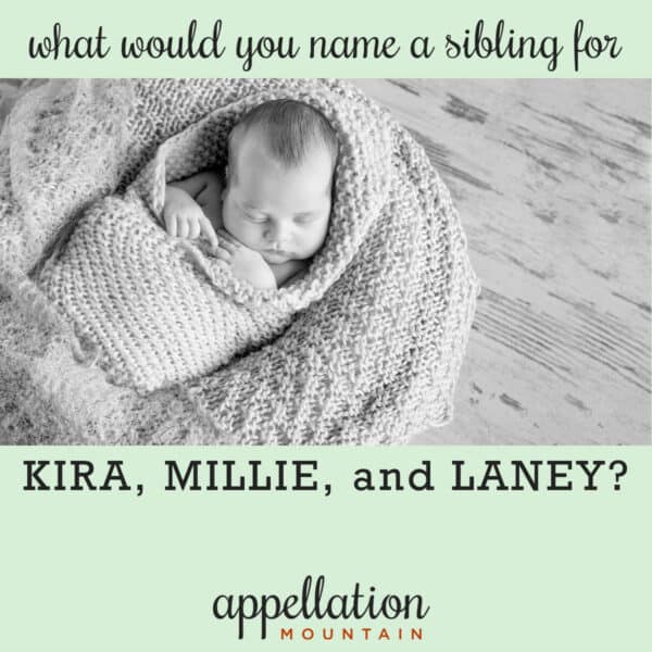 sleeping baby wrapped in blanked in basket; sibling for Kira, Millie, and Laney