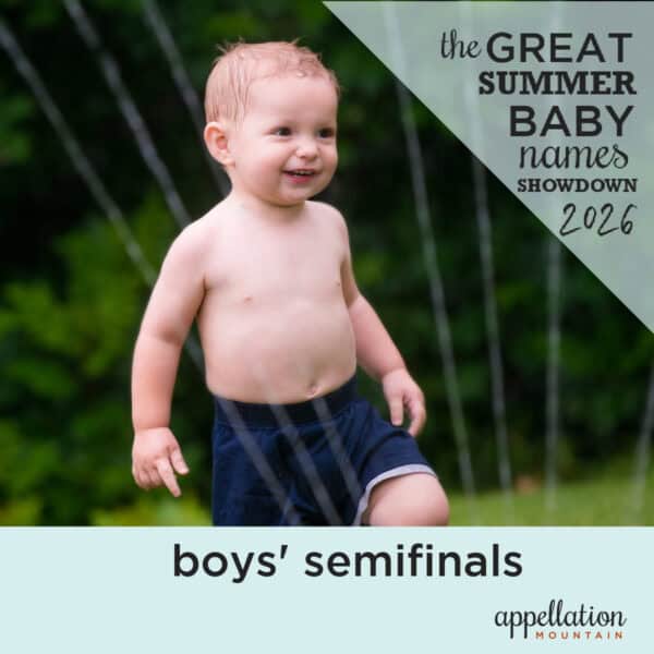 toddler boy wearing navy swim trunks walkng through sprinkler on green grass; New Names Showdown 2026 boys semifinals