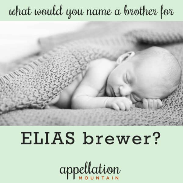 sleeping bald newborn baby under knit blanket; naming a brother for Elias