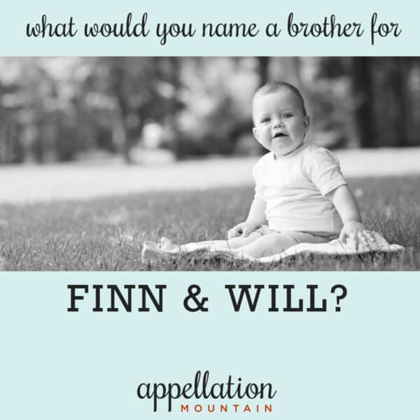 baby boy wearing white onesie sitting outside on blanket; boy names with double consonants, brother for Finn and Will