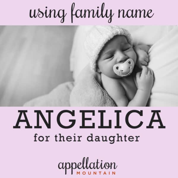 baby wearing knit hat with pacifier sleeping on blanket; using family name Angelica