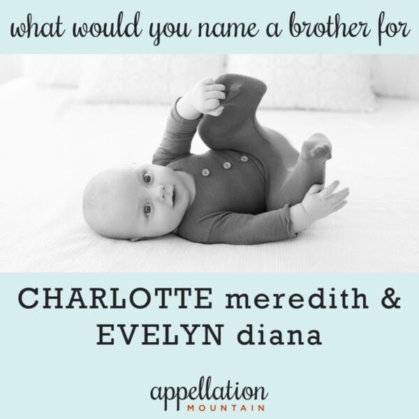 baby boy in dark sleeper suit lying on his back; brother for Charlotte and Evelyn