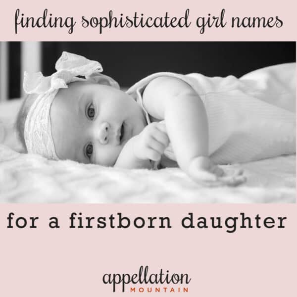 baby girl wearing lace headband lying on her side; sophisticated names for girls